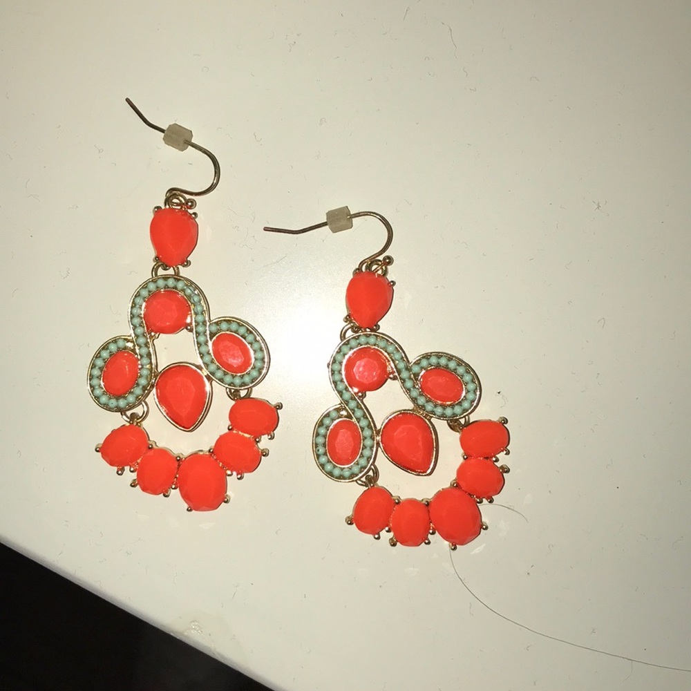 Orange and turquoise statement earrings.
